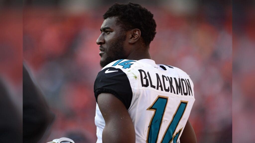 Oct 13, 2013; Denver, CO, USA; Jacksonville Jaguars wide receiver Justin Blackmon (14) on the sidelines in the fourth quarter against the Denver Broncos at Sports Authority Field at Mile High. The Broncos defeated the Jaguars 35-19.