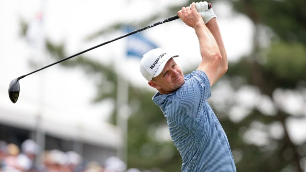 Jun 13, 2025; Oakmont, Pennsylvania, USA; Justin Rose plays his shot from the third tee during the second round of the U.S. Open golf tournament.