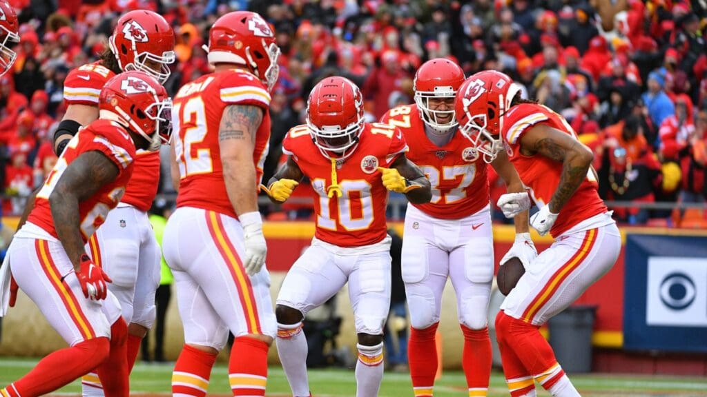Dec 29, 2019; Kansas City, Missouri, USA; Kansas City Chiefs wide receiver Demarcus Robinson (11) celebrates with team mates after his touchdown during the first half against the Los Angeles Chargers at Arrowhead Stadium.