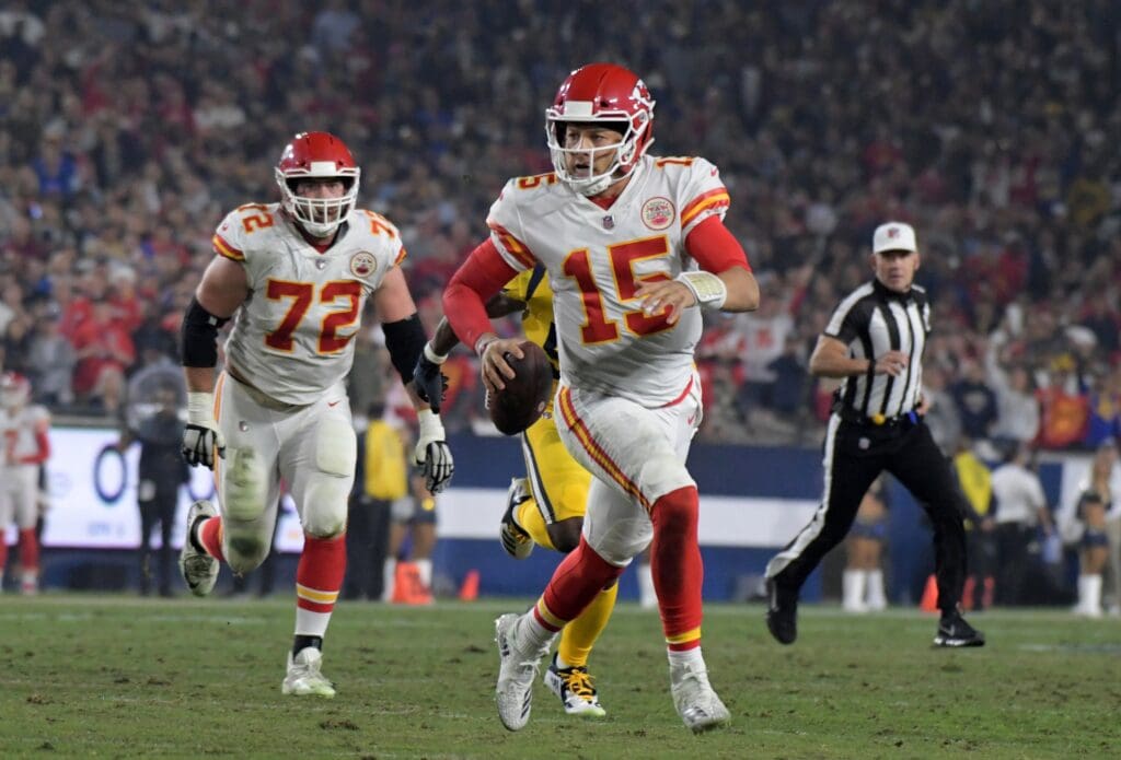Nov 19, 2018; Los Angeles, CA, USA; Kansas City Chiefs quarterback Patrick Mahomes (15) runs against the Los Angeles Rams during the first half at the Los Angeles Memorial Coliseum.