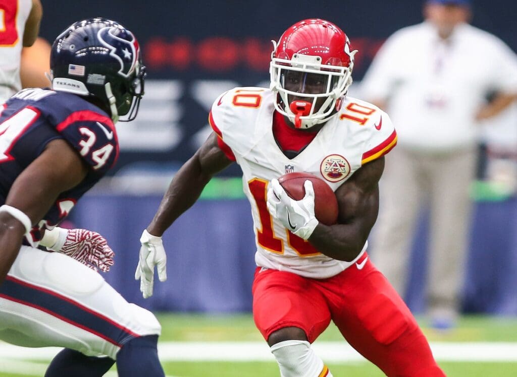 Sep 18, 2016; Houston, TX, USA; Kansas City Chiefs wide receiver Tyreek Hill (10) runs with the ball during the game against the Houston Texans at NRG Stadium.