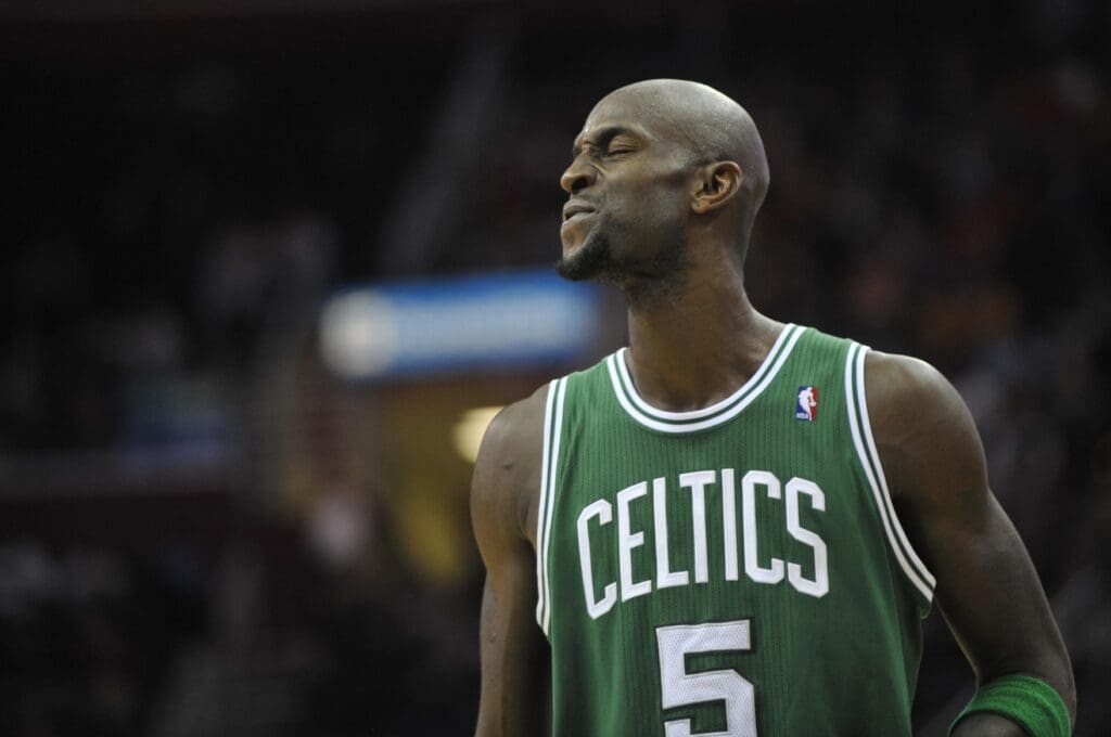 Jan 31, 2012; Cleveland, OH, USA; Boston Celtics power forward Kevin Garnett (5) grimaces after being fouled during a game against the Cleveland Cavaliers at Quicken Loans Arena. The Celtics won 93-90.