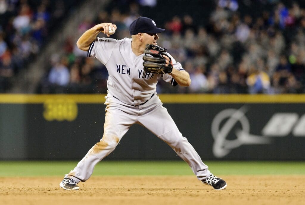 Jun 7, 2013; Seattle, WA, USA; New York Yankees third baseman Kevin Youkilis (36) throws the ball to 1st base to put Seattle Mariners designated hitter Michael Morse (38) (not pictured) out at first base during the 8th inning at Safeco Field.