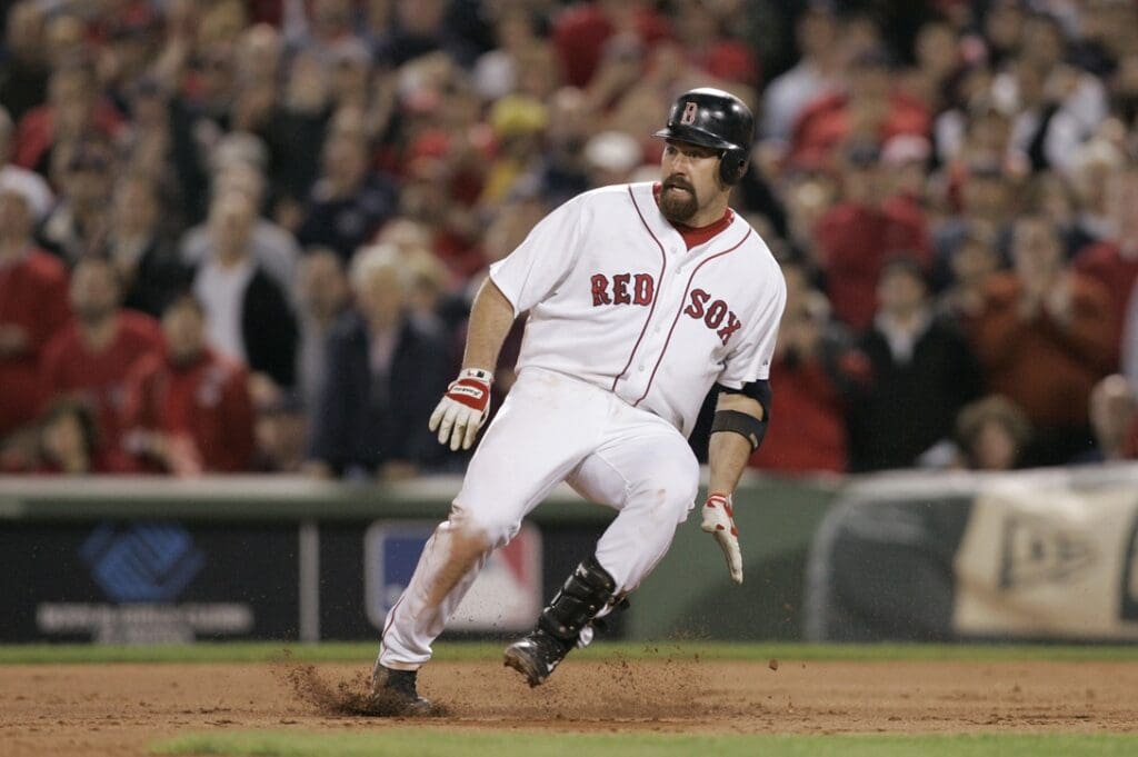 Oct 20, 2007; Boston, MA , USA; Boston Red Sox 1st baseman (20) Kevin Youkilis stops on his way to 2nd base and returns to 1st in the 3rd inning against the Cleveland Indians during game 6 of the 2007 American League Championship Series at Fenway Park.