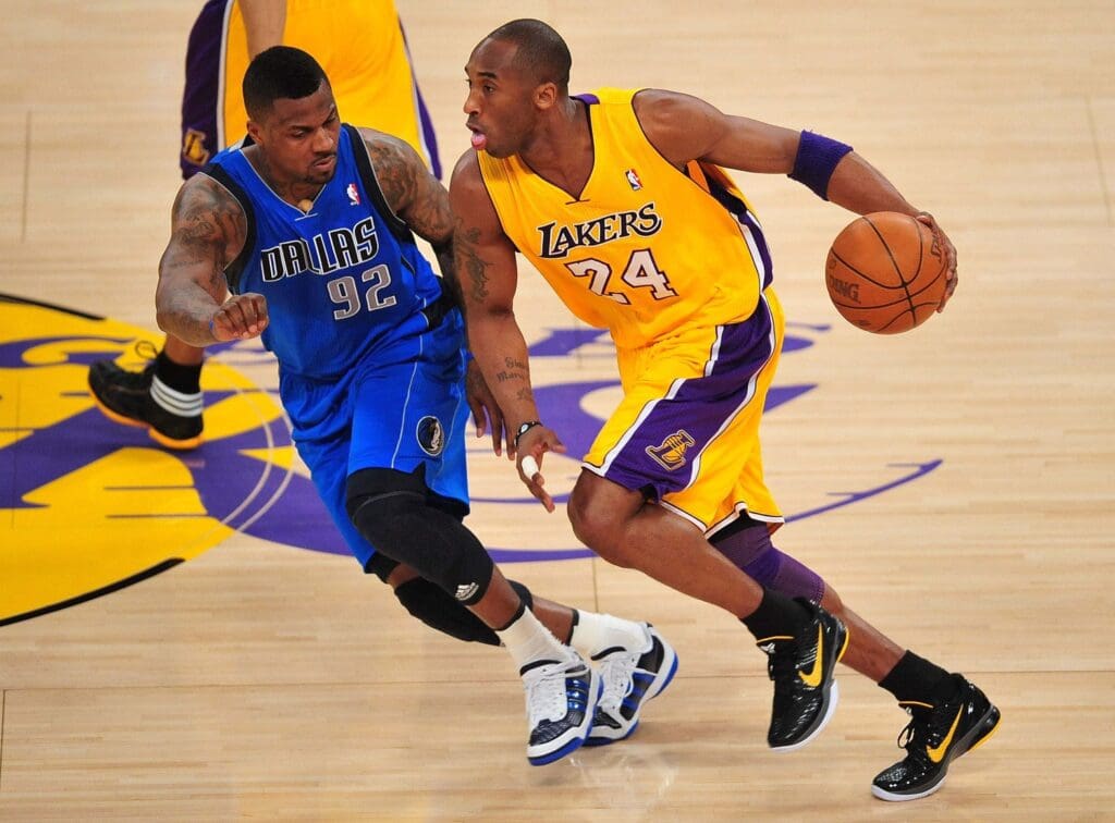 May 4, 2011; Los Angeles, CA, USA; Los Angeles Lakers shooting guard Kobe Bryant (24) moves the ball against the defense of Dallas Mavericks shooting guard DeShawn Stevenson (92) during the first half in game two of the second round of the 2011 NBA playoffs at the Staples Center.