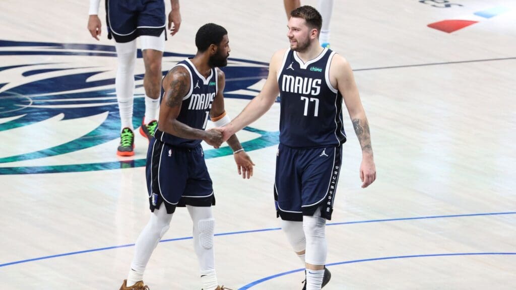 May 26, 2024; Dallas, Texas, USA; Dallas Mavericks guard Luka Doncic (77) and guard Kyrie Irving (11) react in the second half against the Minnesota Timberwolves during game three of the western conference finals for the 2024 NBA playoffs at American Airlines Center.