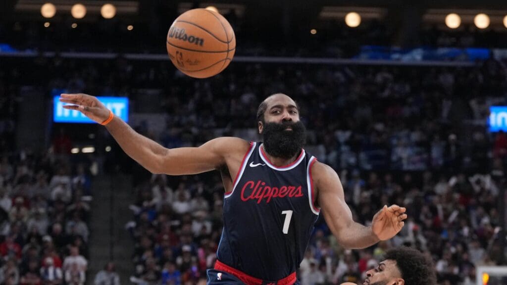 May 1, 2025; Inglewood, California, USA; LA Clippers guard James Harden (1) and Denver Nuggets guard Jamal Murray (27) battle for the ball in the second half during game six of first round for the 2025 NBA Playoffs at Intuit Dome.