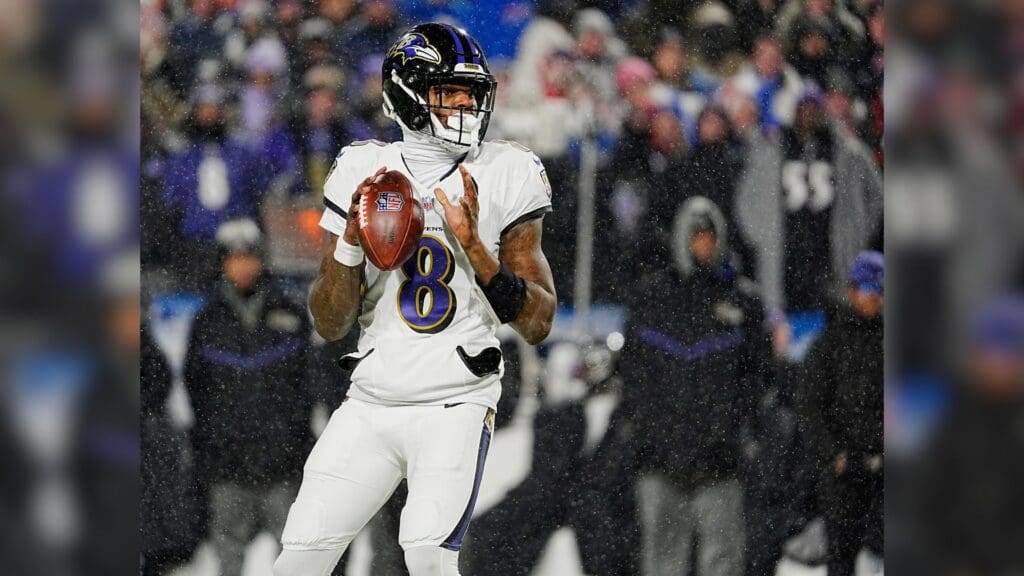 Baltimore Ravens quarterback Lamar Jackson gets ready to launch the ball during first half action at the Buffalo Bills divisional game against the Baltimore Ravens at Highmark Stadium in Orchard Park on Jan. 19, 2025.