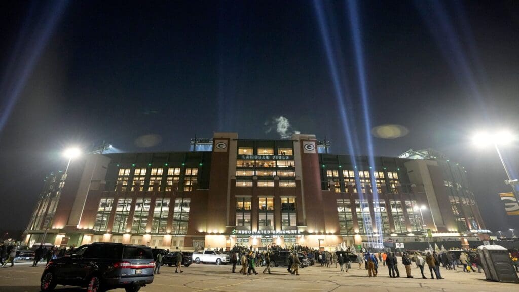 Spectators congregate before the Green Bay Packers game against the Detroit Lions outside Lambeau Field in Green Bay, Wisconsin.