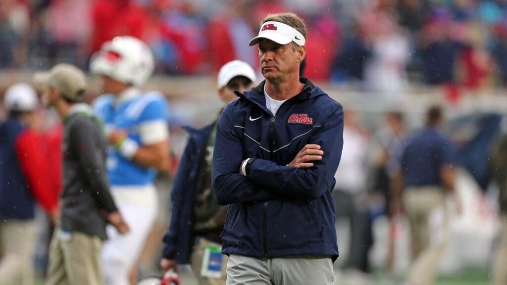 Nov 9, 2024; Oxford, Mississippi, USA; Mississippi Rebels head coach Lane Kiffin watches during warm ups prior to the game against the Georgia Bulldogs at Vaught-Hemingway Stadium.