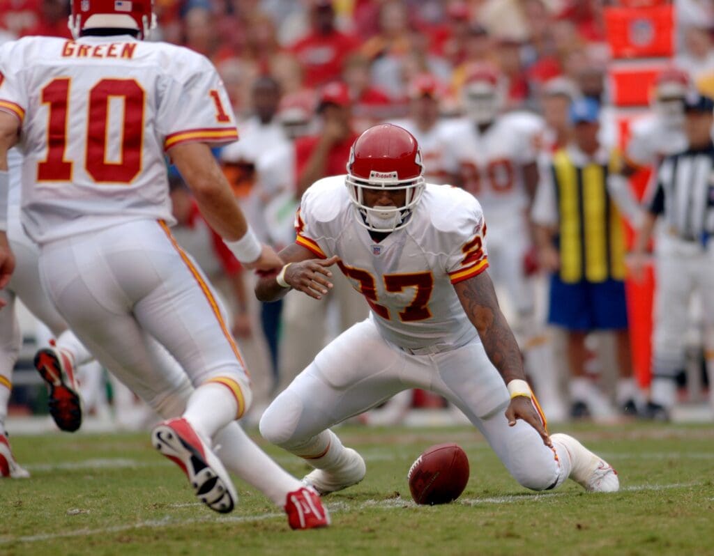 Sep 10, 2006; Kansas City, MO, USA; Kansas City Chiefs running back (27) Larry Johnson recovers a fumble by quarterback (10) Trent Green in the first quarter against the Cincinnati Bengals at Arrowhead Stadium in Kansas City, MO.