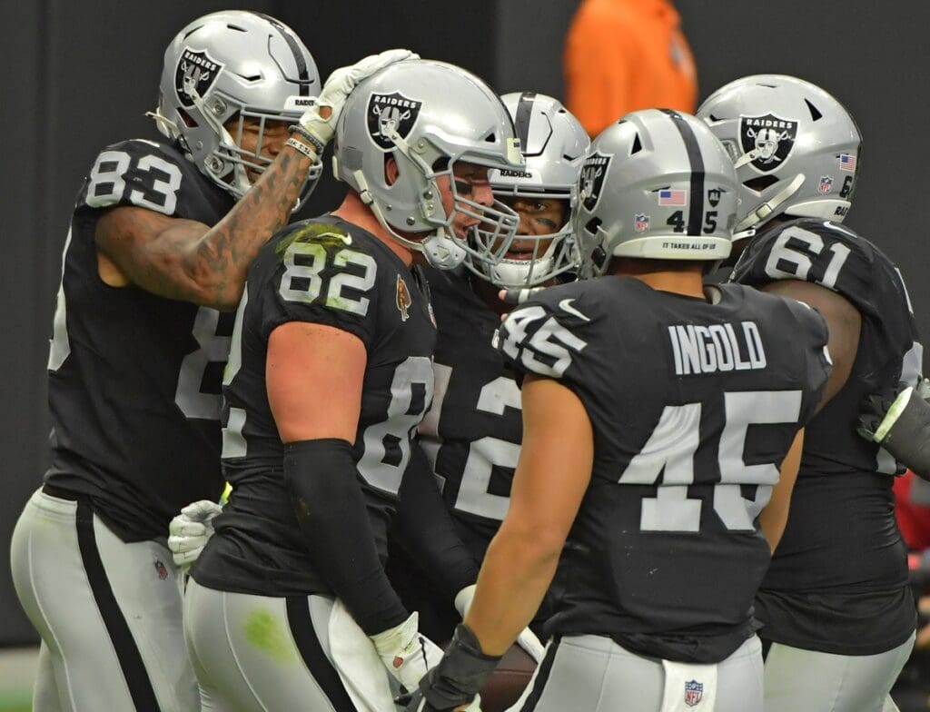 Oct 4, 2020; Paradise, Nevada, USA; Las Vegas Raiders tight end Jason Witten (82) celebrates with team mates after scoring a second quarter touchdown against the Buffalo Bills at Allegiant Stadium.