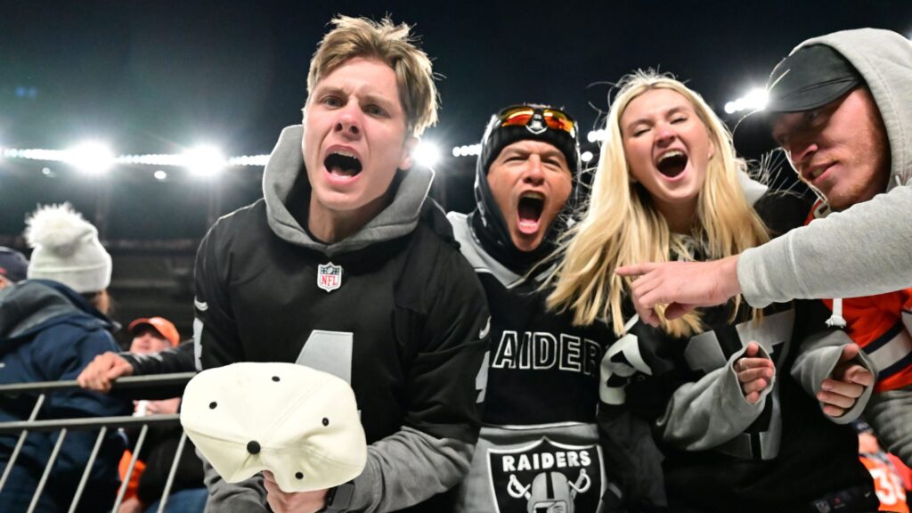 Nov 20, 2022; Denver, Colorado, USA; Las Vegas Raiders fans celebrate defeating the Denver Broncos in overtime at Empower Field at Mile High