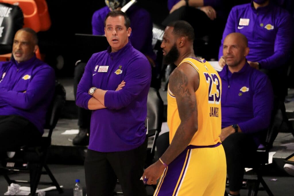 July 30, 2020; Lake Buena Vista, USA; Frank Vogel of the Los Angeles Lakers talks with LeBron James #23 during the fourth quarter of the game against the LA Clippers at The Arena at ESPN Wide World Of Sports Complex on July 30, 2020 in Lake Buena Vista, Florida.