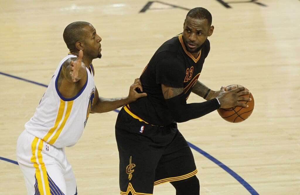 June 13, 2016; Oakland, CA, USA; Cleveland Cavaliers forward LeBron James (23) moves the ball against Golden State Warrior forward Andre Iguodala (9) during the second half in game five of the NBA Finals at Oracle Arena.