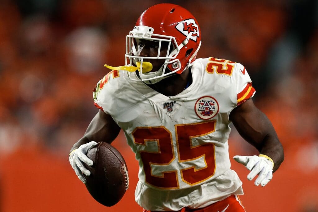 Oct 17, 2019; Denver, CO, USA; Kansas City Chiefs running back LeSean McCoy (25) runs the ball in the first quarter against the Denver Broncos at Empower Field at Mile High.