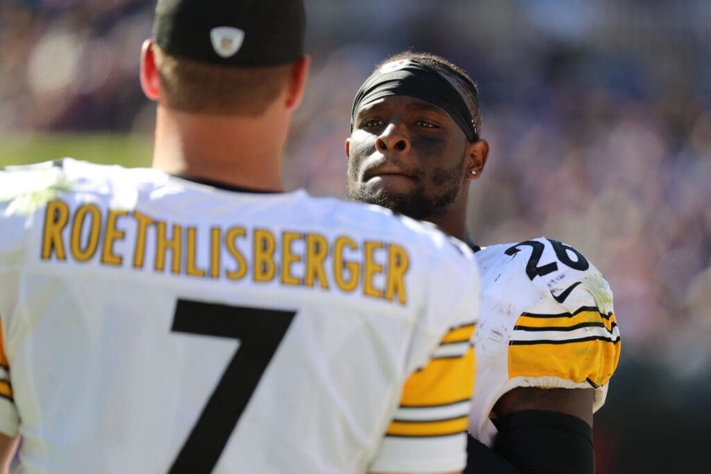 Oct 1, 2017; Baltimore, MD, USA; Pittsburgh Steelers running back LeVeon Bell (26) talks with quarterback Ben Roethlisberger (7) on the sideline during the game against the Baltimore Ravens at M&T Bank Stadium.