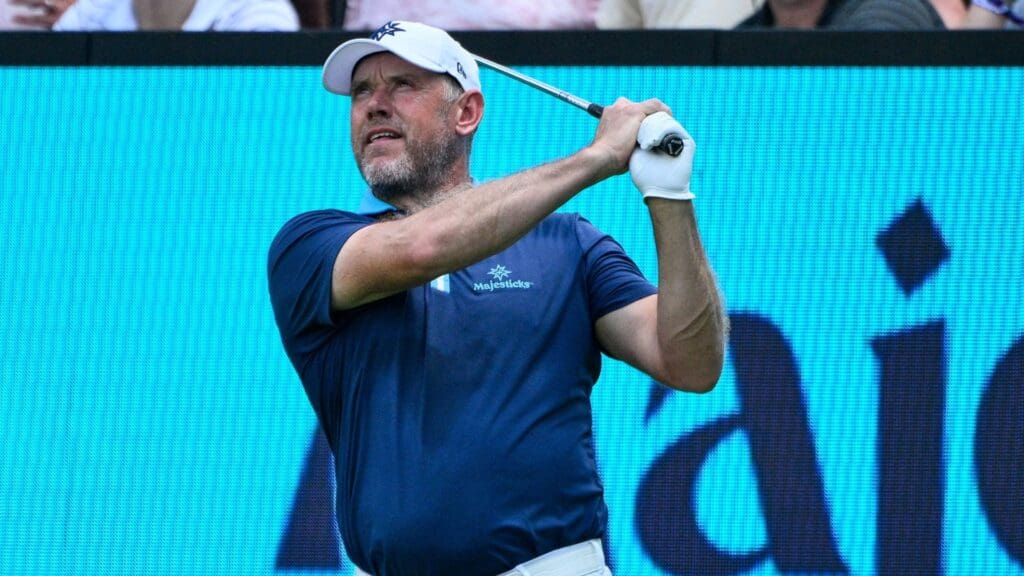 Jun 21, 2024; Nashville, Tennessee, USA; Lee Westwood of Majesticks GC hits a tee shot at the 15th hole at The Grove.