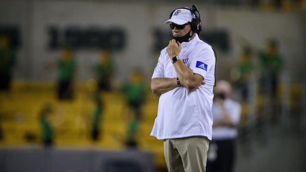 Sep 26, 2020; Waco, Texas, USA; Kansas Jayhawks head coach Les Miles watches his team take on the Baylor Bears during the second half at McLane Stadium.