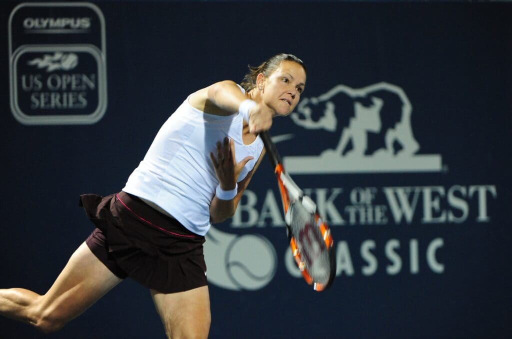 July 28, 2010; Stanford, CA, USA; Lindsay Davenport (USA) serves in the first round play against Melanie Oudin (USA), not pictured, and Michaella Krajicek (NED), not pictured, during the Bank of the West Classic women's tennis tournament at the Taube Family Tennis Stadium. Davenport's doubles partner is Liezel Huber (USA). Davenport/Huber defeated Krajicek/Oudin 6-4, 6-2.