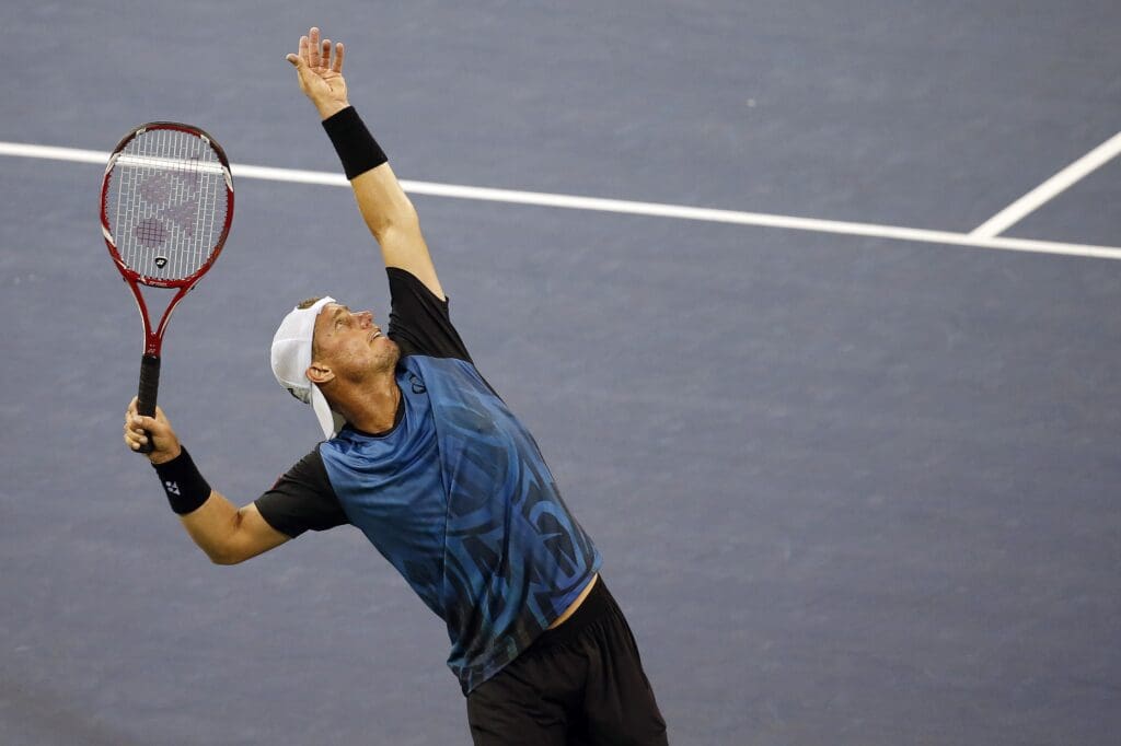 Sep 3, 2015; New York, NY, USA; Lleyton Hewitt of Australia serves against Bernard Tomic of Australia (not pictured) on day four of the 2015 U.S. Open tennis tournament at USTA Billie Jean King National Tennis Center. Tomic won 6-3, 6-2, 3-6, 5-7, 7-5