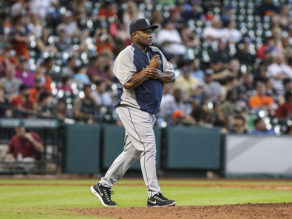 May 4, 2014; Houston, TX, USA; Seattle Mariners manager Lloyd McClendon (23) walks onto the field during the fifth inning against the Houston Astros at Minute Maid Park.