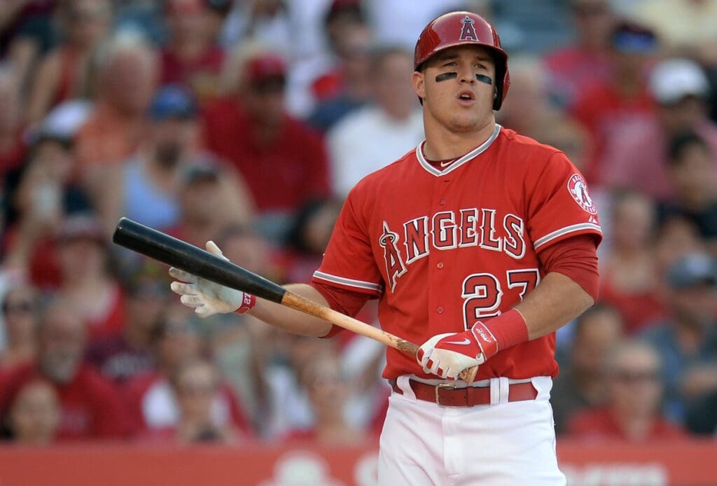 Apr 30, 2014; Anaheim, CA, USA; Los Angeles Angels center fielder Mike Trout (27) watches a ball sail foul in the third inning of the game against the Cleveland Indians at Angel Stadium of Anaheim.