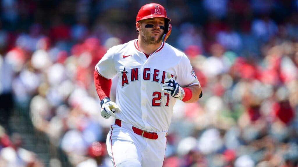 Los Angeles Angels designated hitter Mike Trout (27) hits a single against the Athletics during the fourth inning at Angel Stadium