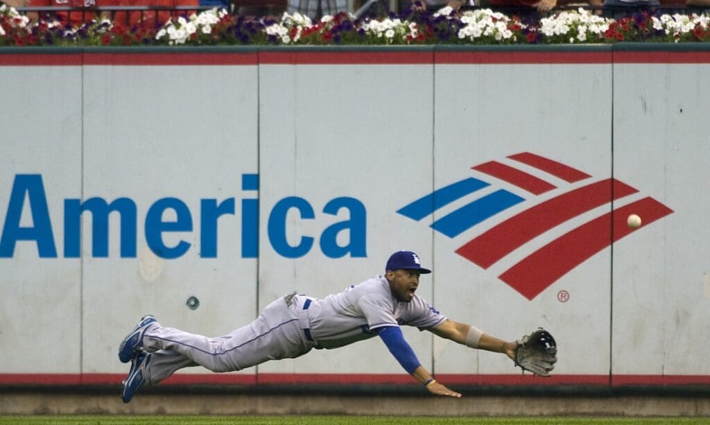 July 30, 2009; St, Louis, MO, USA; Los Angeles Dodgers center fielder Matt Kemp (27) dives for a ball hit by St. Louis Cardinals first baseman Albert Pujols (not pictured) in the first inning at Busch Stadium.
