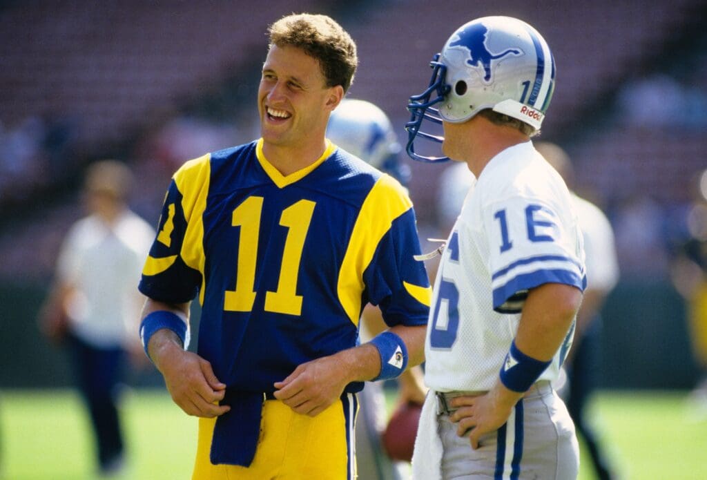 Oct 19, 1986; Anaheim, CA, USA; FILE PHOTO; Los Angeles Rams quarterback Jim Everett (11) talks with Detroit Lions quarterback Chuck Long prior to a game at Anaheim Stadium.