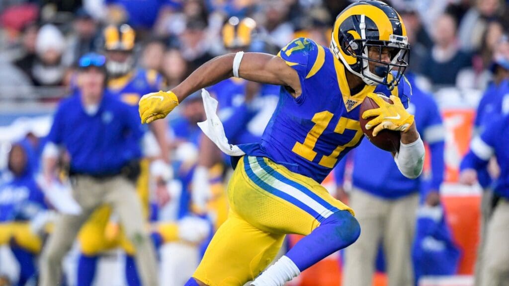 Dec 29, 2019; Los Angeles, California, USA; Los Angeles Rams wide receiver Robert Woods (17) heads upfield with a pass during the fourth quarter against the Arizona Cardinals at Los Angeles Memorial Coliseum.