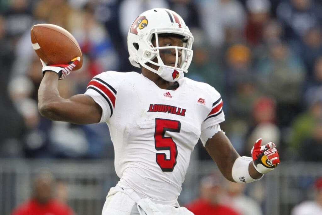 Nov 19, 2011; East Hartford, CT, USA; Louisville Cardinals quarterback Teddy Bridgewater (5) throws a pass in the fourth quarter against the Connecticut Huskies at Rentschler Field. The Cardinals defeated the Huskies 34-20.