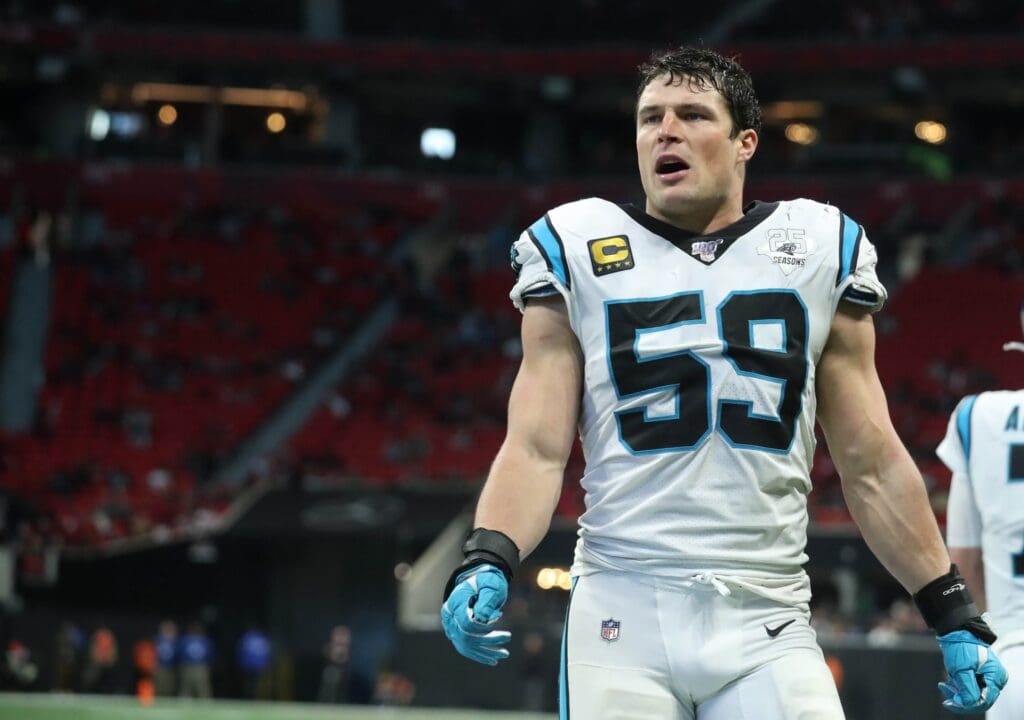 Dec 8, 2019; Atlanta, GA, USA; Carolina Panthers middle linebacker Luke Kuechly (59) greets teammates after a touchdown in the fourth quarter against the Atlanta Falcons at Mercedes-Benz Stadium.
