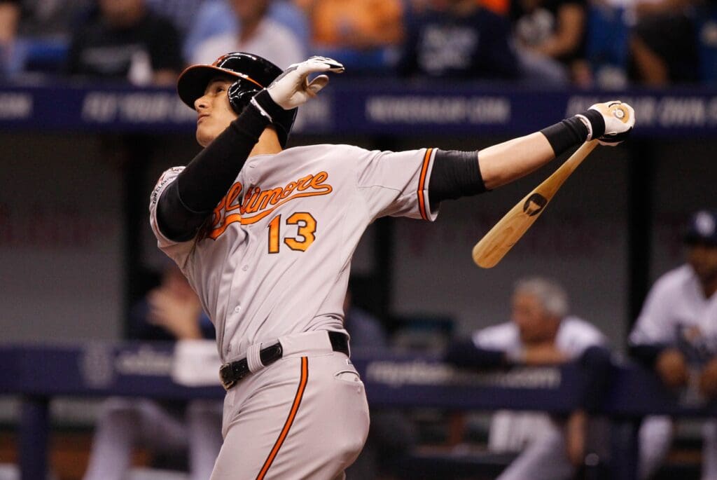 Jun 16, 2014; St. Petersburg, FL, USA; Baltimore Orioles third baseman Manny Machado (13) at bat against the Tampa Bay Rays at Tropicana Field.