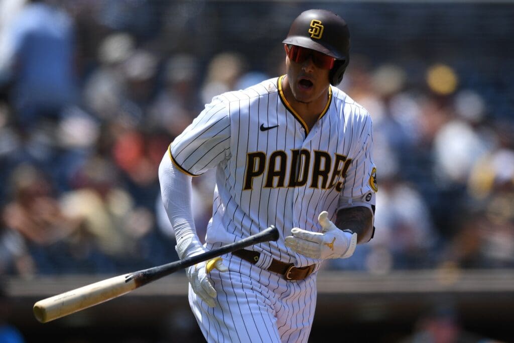 Aug 11, 2021; San Diego, California, USA; San Diego Padres third baseman Manny Machado (13) tosses his bat after flying out during the first inning against the Miami Marlins at Petco Park.