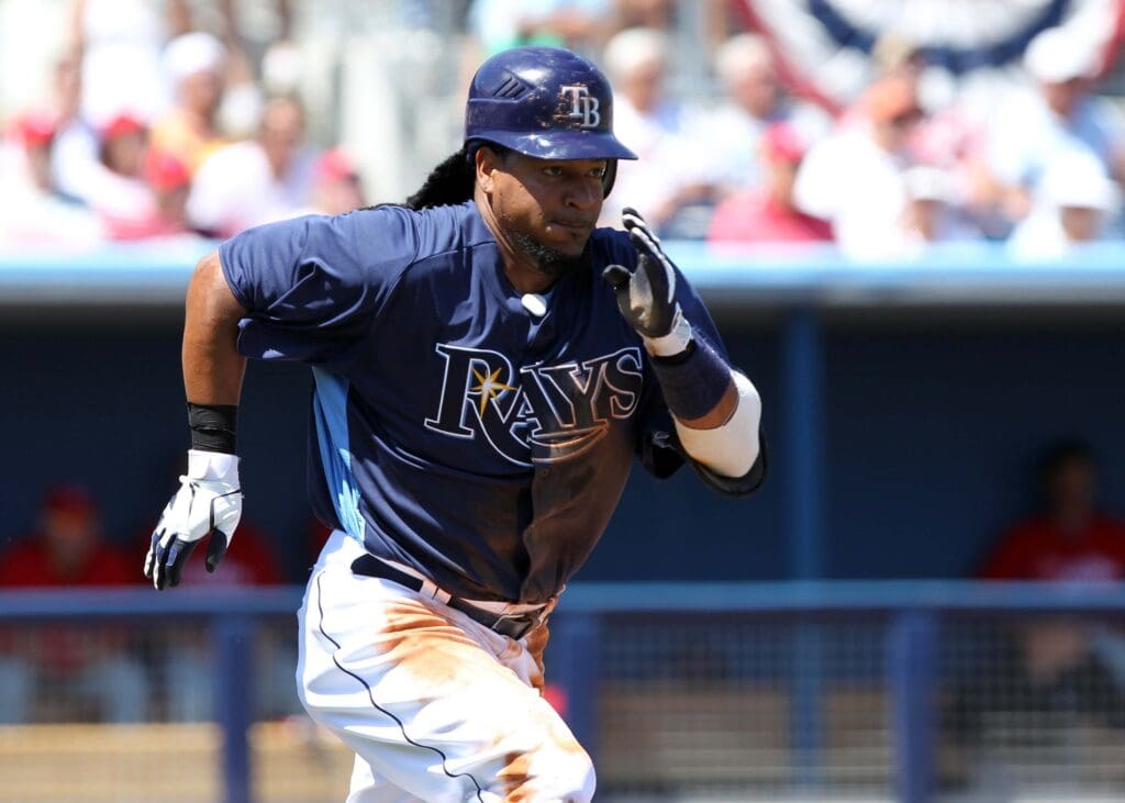 March 23, 2011; Port Charlotte, FL, USA; Tampa Bay Rays left fielder Manny Ramirez (24) runs to first as he hit a single during their spring training game against the Philadelphia Phillies at Charlotte Sports Park