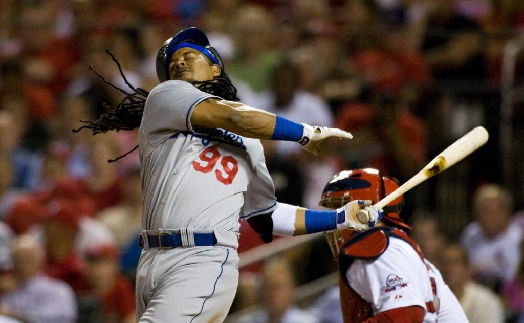 July 29, 2009; St, Louis, MO, USA; Los Angeles Dodgers left fielder Manny Ramirez (99) strikes out in the eighth inning against the St. Louis Cardinals at Busch Stadium.