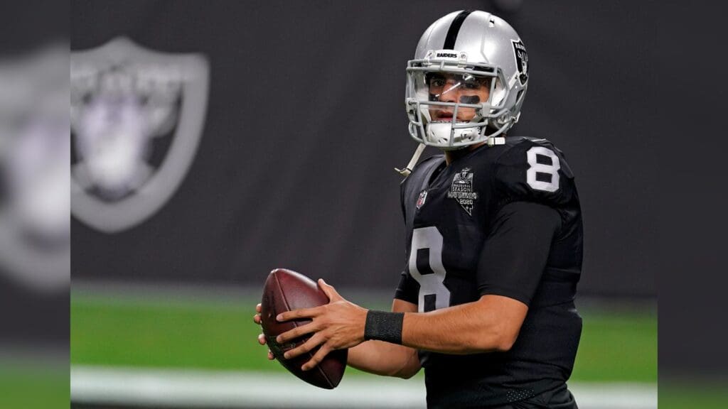 Dec 26, 2020; Paradise, Nevada, USA; Las Vegas Raiders quarterback Marcus Mariota (8) warms up before a game against the Miami Dolphins at Allegiant Stadium.