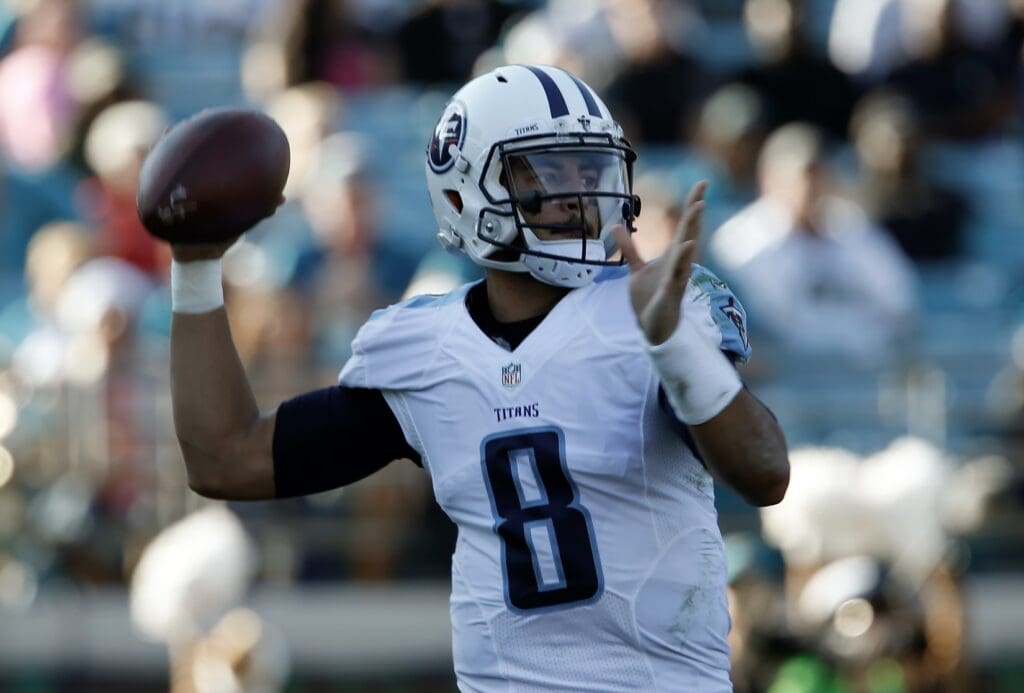 Dec 24, 2016; Jacksonville, FL, USA; Tennessee Titans quarterback Marcus Mariota (8) throws a pass during the third quarter of an NFL Football game against the Jacksonville Jaguars at EverBank Field.
