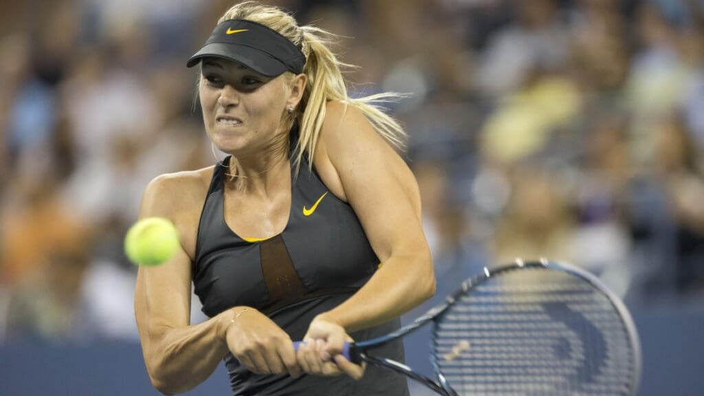 Aug 29, 2012; Queens, NY, USA; Maria Sharapova (RUS) returns a shot against Lourdes Dominguez Lino (ESP) on day three of the 2012 US Open at Billie Jean King National Tennis Center. Sharapova won 6-0, 6-1.