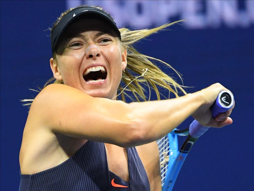 Aug 26, 2019; Flushing, NY, USA; Maria Sharapova of Russia hits to Serena Williams of the USA in the first round on day one of the 2019 U.S. Open tennis tournament at USTA Billie Jean King National Tennis Center.