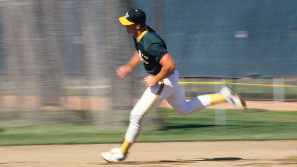 Unknown Date; Unknown Location, USA; FILE PHOTO; Oakland Athletics infielder Mark McGwire running during spring training