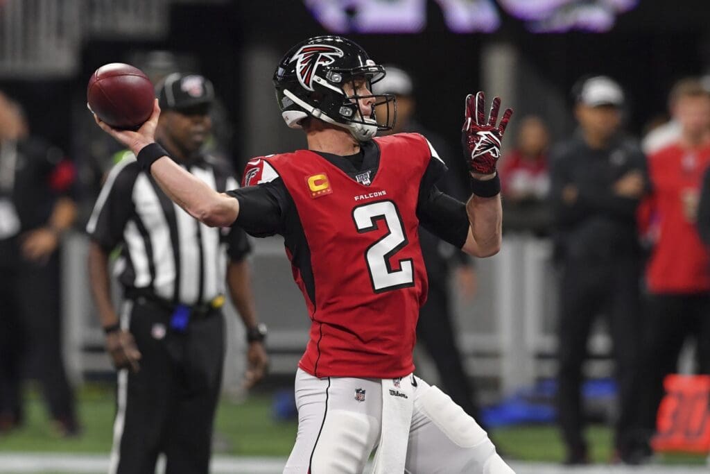 Dec 22, 2019; Atlanta, Georgia, USA; Atlanta Falcons quarterback Matt Ryan (2) passes against the Jacksonville Jaguars during the first quarter at Mercedes-Benz Stadium.