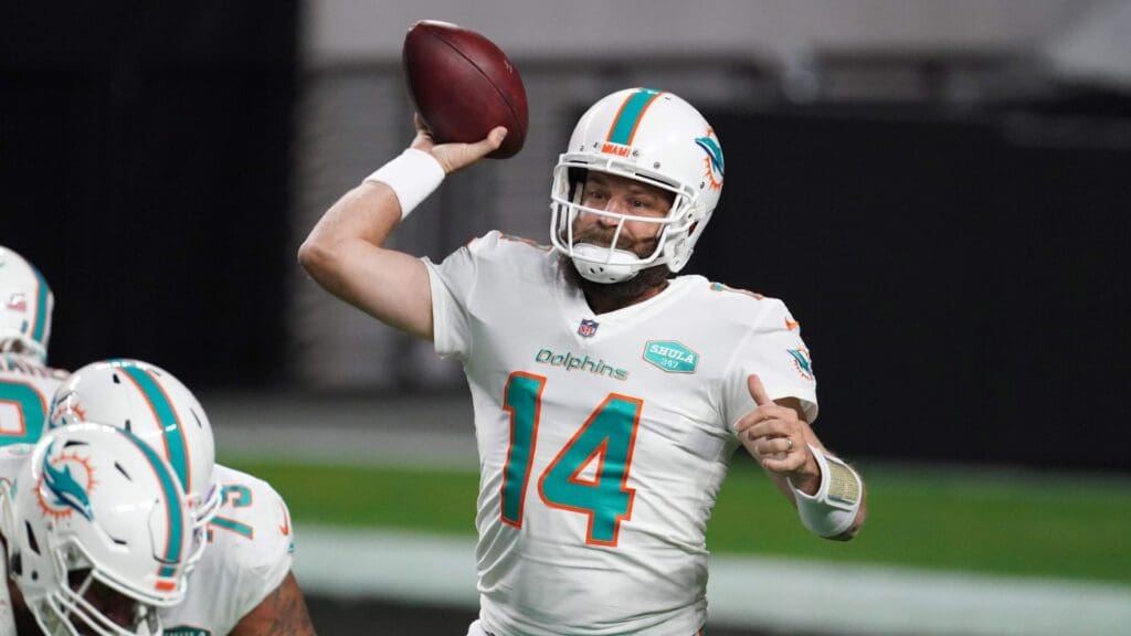 Dec 26, 2020; Paradise, Nevada, USA; Miami Dolphins quarterback Ryan Fitzpatrick (14) throws a pass in the fourth quarter against the Las Vegas Raidersat Allegiant Stadium. The Dolphins defeated the Raiders 26-25