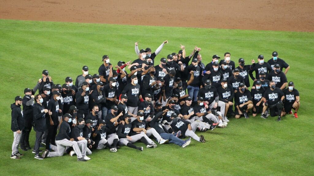 Sep 25, 2020; Bronx, New York, USA; The Miami Marlins celebrate and take a team picture after defeating the New York Yankees at Yankee Stadium to clinch a playoff berth.