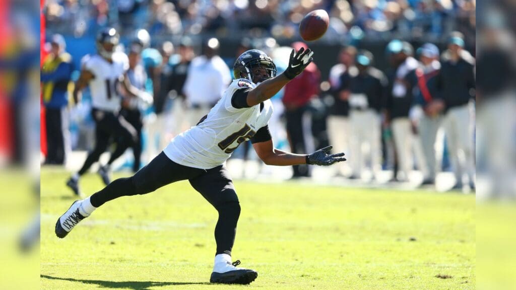 Oct 28, 2018; Charlotte, NC, USA; Baltimore Ravens wide receiver Michael Crabtree (15) attempts to catch a pass in the second quarter against the Carolina Panthers at Bank of America Stadium.