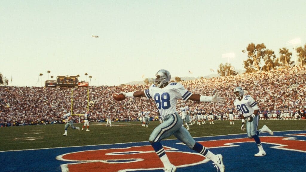 Jan 31, 1993; Pasadena, CA, USA; FILE PHOTO; Dallas Cowboys receiver Michael Irvin (88) celebrates in the endzone after scoring a touchdown against the Buffalo Bills during Super Bowl XXVII at the Rose Bowl. The Cowboys defeated the Bills 52-17.
