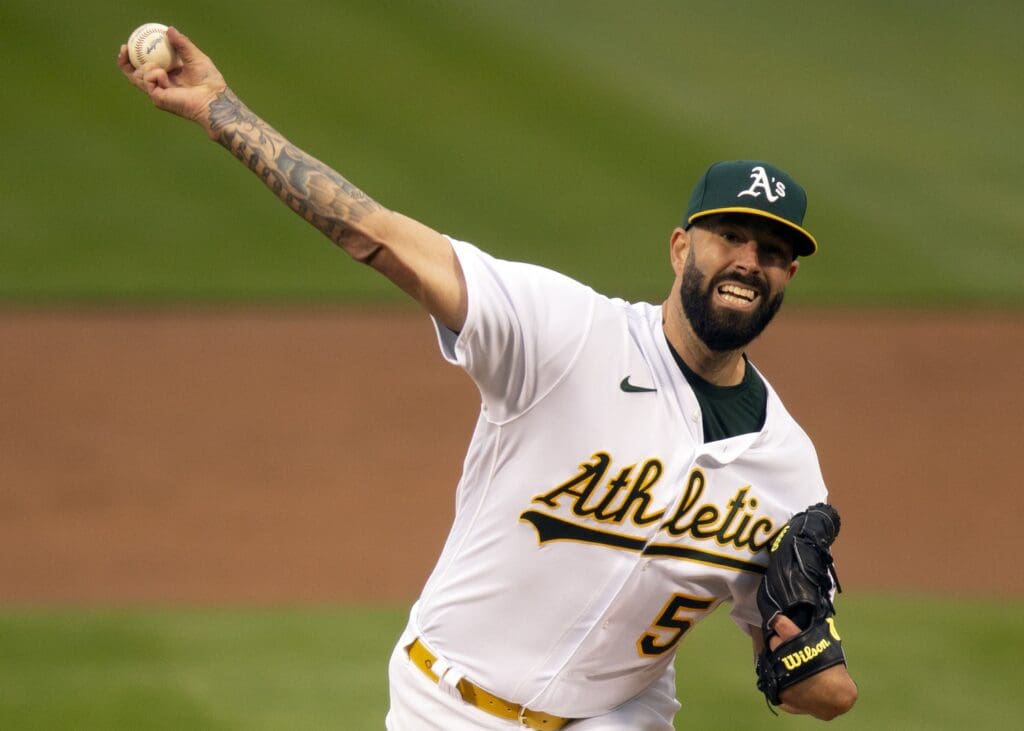 Apr 30, 2021; Oakland, California, USA; Oakland Athletics starting pitcher Mike Fiers (50) delivers a pitch against the Baltimore Orioles during the second inning at RingCentral Coliseum.