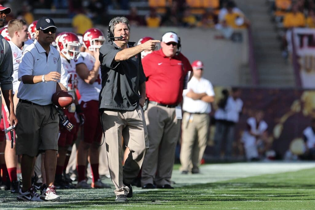 Nov 17, 2012; Tempe, AZ, USA; Washington State Cougars head coach Mike Leach reacts on the sidelines during the third quarter against the Arizona State Sun Devils at Sun Devil Stadium.
