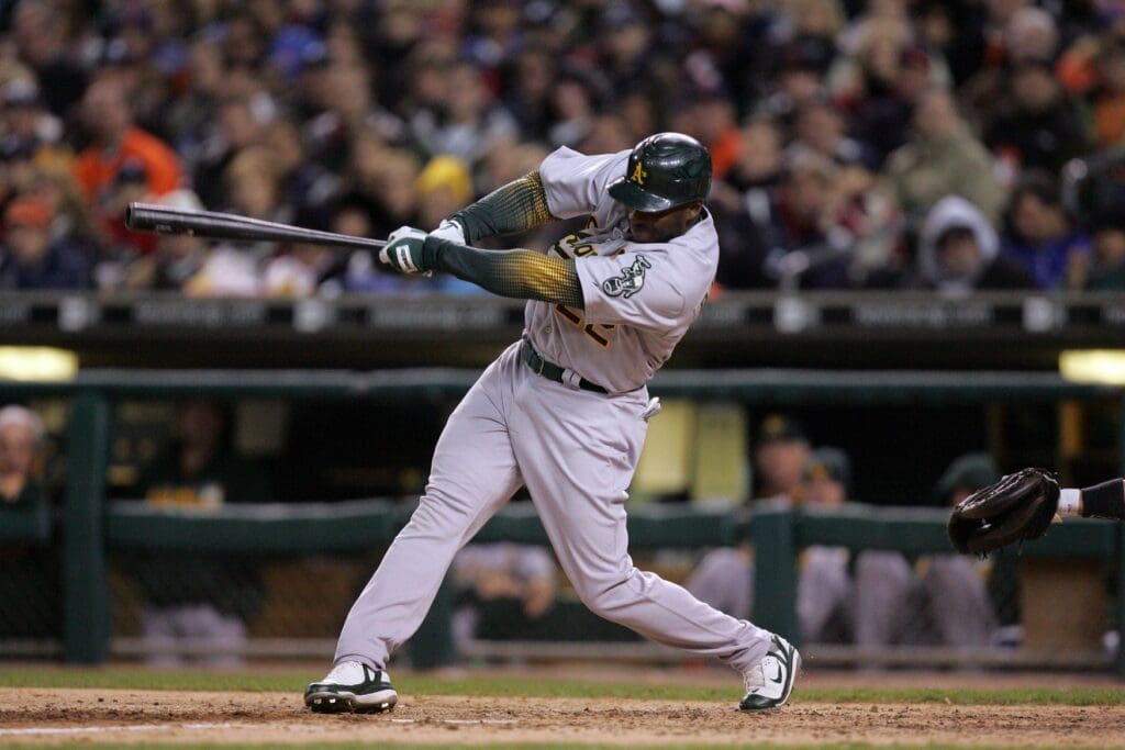 Oct 14, 2006; Detroit, MI, USA; Oakland Athletics right fielder (22) Milton Bradley singles to lead off the eighth inning against the Detroit Tigers in game 4 of the American League Championship series at Comerica Park.